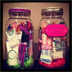 two jars filled with different types of pens, markers and other items that say thank you