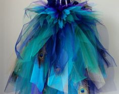 a dress made out of tulle and feathers