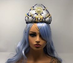 Blue, Silver, and Gold Mermaid Crown with real seashells, blue beads, and gold chain Just what you always dreamed of, being a creature of the sea, a mermaid. Whether you are a siren, goddess, princess, evil witch, or fairy sea creature, you deserve this crown to portray your true self! Use it for beach weddings or mermaid cosplays.  This crown was made to fit an adult comfortably. This crown has a comfortable headband with metal combs to hold it on your head. The gold chain accents your face with a small bead attached. Each of these crowns have been handmade by me, using real seashells, starfish, gems, pearl beads, and crystals. Each crown is unique making no two alike. If you are interested in a custom piece, or having several matching pieces for events such as a wedding, please message m Ocean-inspired Gold Beaded Shell, Ocean-inspired Beaded Gold Shell, Gold Beaded Shell With Ocean-inspired Style, Blue Beaded Shell, Beaded Blue Shell, Handmade Blue Shell, Siren Goddess, Orange Mermaid, Gold Mermaid