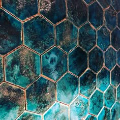 an abstract photograph of blue and green hexagonal tiles