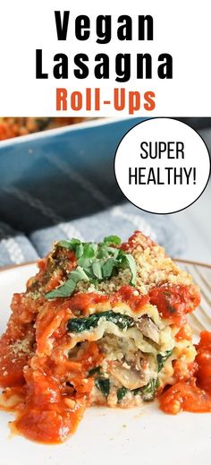 vegetarian lasagna roll - ups on a plate with a speech bubble above it