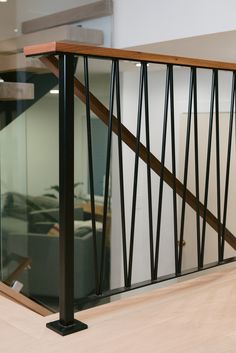 the railing is made of metal and wood