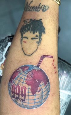 a man's arm with tattoos on it and an image of a person holding a drink