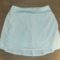 New Without Tags, Aqua Color Nike Summer Lined Skort, Nike Summer Skort With Lined Skirt, Nike Blue Skort For Spring, Nike Lined Skort For Summer, Floral Nikes, Nike Skirts, Navy Blue Skirt, Pleated Jacket, Tennis Skort