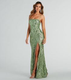 A sequin scroll pattern brings elegant sparkle to the Jillian formal long dress! She features a classy square neckline, a padded bust, and adjustable spaghetti straps. Her curve-flaunting mermaid silhouette is designed with a sexy high front slit for movement and a floor-length hem for a sophisticated finish. Mermaid Long Dress, Formal Long Dress, Glitter Prom Dresses, Formal Maxi Dress, Scroll Pattern, Short Summer Dresses, Sequin Prom Dresses, Prom Dress Shopping, Green Prom Dress