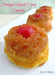 two pineapple upside down cupcakes on a white plate