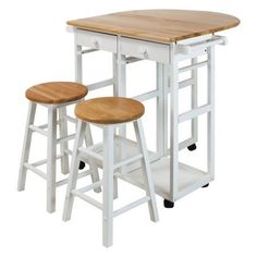 three stools and a table with a wooden top