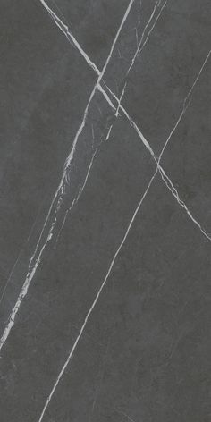 a black and white marble textured wallpaper with cross marks in the middle on it