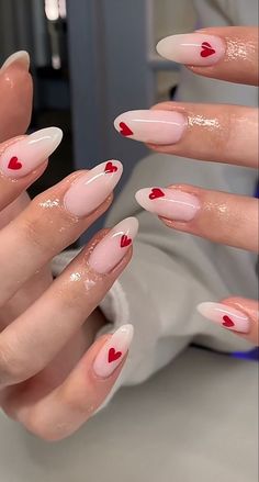 Trendy Almond Nails Valentines, Valentine Day Nails Simple, Heart Nail Stickers, Valentines Nails2023, Almond Acrylic Nails Heart, Pink Nails With Red Heart On Ring Finger, Cute Simple Valentines Nails Almond, Small Hearts On Nails, Sparkly Valentines Day Nails