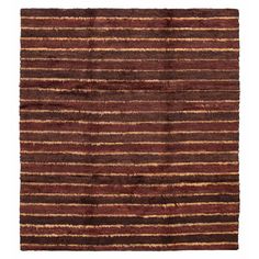 a brown and red striped rug on a white background with no one in the photo