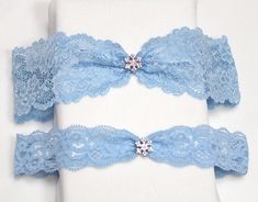 "Simple lace garter made of blue stretchy lace with silver charm. ★ This listing is for the garter set - including the keepsake and tossing garters. * 2.5\" and 1\" wide blue lace stretchy band * stretch lace band available in blue, white and ivory * silver snowflake charm * comes with a box * Here is a listing for the keepsake garter. https://www.etsy.com/listing/262313886/blue-lace-garter-lace-garter-wedding?ref=shop_home_active_8 CUSTOM ORDER Please choose your thigh size (where you will be w Sincerity Wedding Dress, Garter Set Wedding, Lace Garter Set, Wedding Graphics, Blue Garter, Wedding Garter Set, Wedding Garters, Turquoise Wedding, Wedding Blue