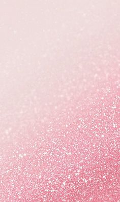 a pink and white background with glitter