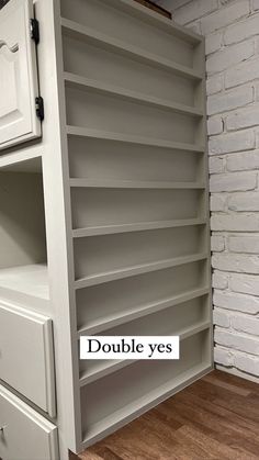 an empty bookcase with the words double yes on it