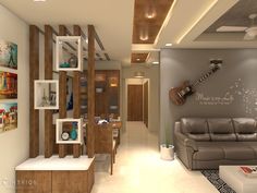 a living room filled with lots of furniture next to a wall mounted guitar on the wall