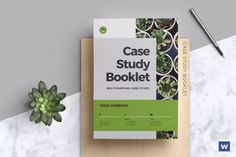 the case study booklet is next to a plant