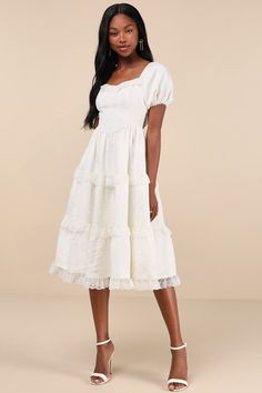 We're totally falling for dreamy and sweet vibes of the Lulus Gorgeously Romantic Ivory Lace Puff Sleeve Tiered Midi Dress! Lightweight woven fabric, with a subtle jacquard design, shapes short puff sleeves with elastic at the cuffs and shoulders. Bodice has a subtle sweetheart neckline and a flattering seamed fit that continues down to a Basque-inspired waist. Tiered skirt boasts adorable lace trim throughout as it falls to a flaring midi hem. Matching lace lines the cuffs and neck to complete Sweet Vibes, Design Shapes, Ivory Lace Dress, Jacquard Design, Just Style, Tiered Midi Dress, Tier Skirt, Ivory Lace, Tiered Skirt