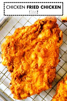 fried chicken is sitting on a cooling rack