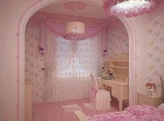 a bedroom with pink walls and floral wallpaper on the walls is decorated in pastel colors