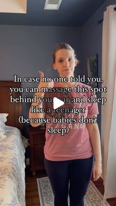 a woman standing in front of a bed with her hand up to the camera and text that reads, in case no one told you, you can massage this spot behind your own