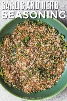 garlic and herb seasoning in a green bowl with text overlay that reads garlic and herb seasoning