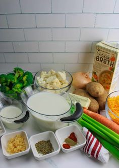 vegetables, milk, cheese and other ingredients on a counter