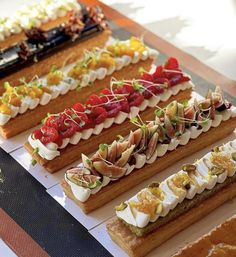 there are many different types of desserts on the table, each with different toppings