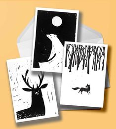 three cards with black and white images of deer in the woods, one has a full moon