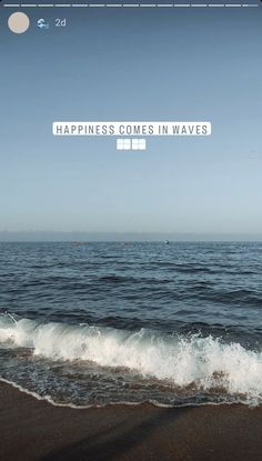 there is a message on the screen that says happiness comes in waves and people are swimming in the ocean