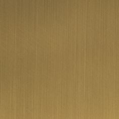 an image of a gold background that looks like it could be brushed or stained in