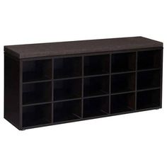 a large black shelf with many compartments