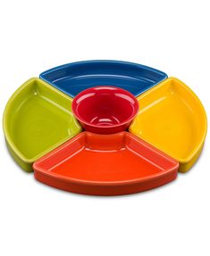 three different colored plates with one empty bowl on the top and one empty plate on the bottom