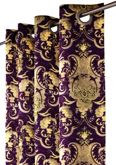 purple and gold damask curtains hanging on a curtain rod in front of a white background