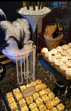 an assortment of desserts and pastries on display