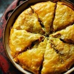 a pie sitting in a pan on top of a table