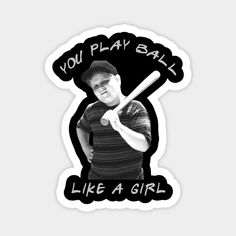 a man holding a baseball bat with the words you play ball like a girl on it