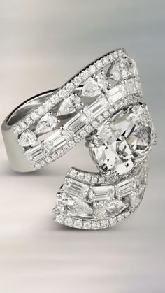 an engagement ring with two rows of diamonds on it