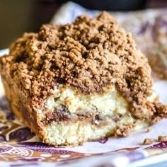 a close up of a piece of cake on a plate with a fork in it