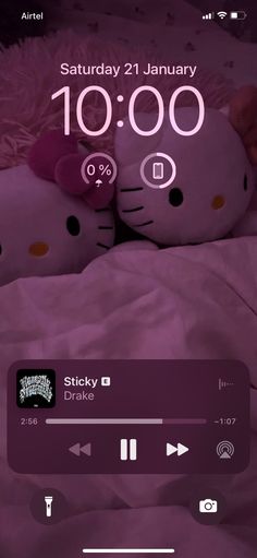 the hello kitty alarm clock is displayed on an iphone screen, and it's time