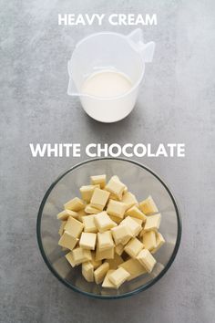 the ingredients to make white chocolate in a bowl, including milk and butter cubes