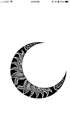 a black and white drawing of a crescent with an intricate design on the bottom half