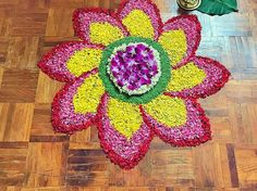 a flower made out of flowers on the floor