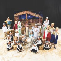 a group of children dressed up in nativity costumes