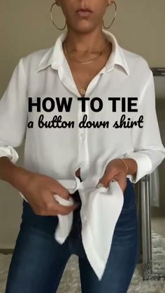 a woman is wearing a white shirt with the words how to tie a button down shirt