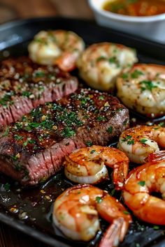 steak with shrimp and shrimp on a plate