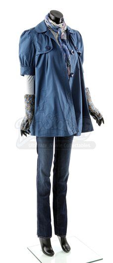 a mannequin wearing a blue jacket and jeans