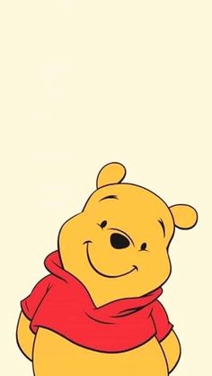 winnie the pooh is wearing a red scarf