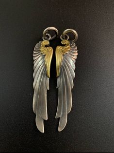 Each is 67.8mm long Width 14.5mm The yellow part is brass The price is for one pair Angel Wing Jewelry, Jewelry Fabrication, Angel Wings Pendant, Angel Wings Jewelry, Wings Pendant, Wing Jewelry, Angel Wing Pendant, Angel Pendant, Silver Brass