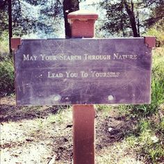 a sign that says may your search through nature lead you to yourself on the trail