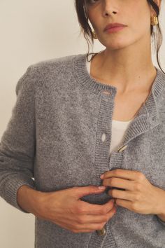 Our 100% cashmere Greta long-sleeve cardigan is the staple piece you need. Perfect for Layering your look and add a touch of something special. Wear it closed up to the top to play it preppy, or open for a more relaxed fit. Unisex and versatile as always, it allows you to express yourself and interpret it as you want, giving you the touch of elegance you need in every fit. Charlotte’s fashion tip: "I love how this piece follows my moods everyday ! When I’m playing the elegance card, I like to wear it on its own, closed, paired with a scarf. When I’m in the mood for a more casual outfit yet with the bit of sophistication I always like, but with the touch of sophistication I always crave for, I leave it open with a nice cashmere and silk top." A true staple piece! Everyday Fine Knit Cashmere Outerwear, Cozy Fine Knit Outerwear For Layering, Everyday Winter Cashmere Cardigan, Cashmere Long Sleeve Sweater With Button Closure, Cashmere Soft Knit Cardigan For Loungewear, Fall Cashmere Cardigan For Layering, Fine Knit Long Sleeve Outerwear For Loungewear, Cozy Cashmere Sweater For Everyday, Cozy Everyday Cashmere Sweater