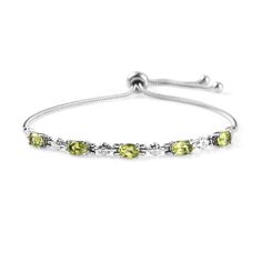 PRICES MAY VARY. OLIVE GREEN PERIDOT BRACELET - Elevate your style with the undeniable beauty of our 5-stone peridot bracelet for women, meticulously crafted to adorn your wrist with unparalleled elegance. The peridot charm bracelet features five sparkling peridot gemstones, each radiating a mesmerizing hue of vibrant olive green. STAINLESS STEEL - The peridot stainless steel bracelets for women are made of stainless steel known for their natural elegance and strength. This stainless steel brace Green Oval Bracelets For Anniversary, Green Adjustable Chain Jewelry For Anniversary, Green Jewelry With Adjustable Chain For Anniversary, Green Birthstone Bracelets For Anniversary, Green Birthstone Bracelet For Anniversary, Lime Green Gemstone Jewelry For Wedding, Lime Green Gemstone Wedding Jewelry, Green Bracelet Jewelry For Wedding, Adjustable Green Jewelry For Wedding